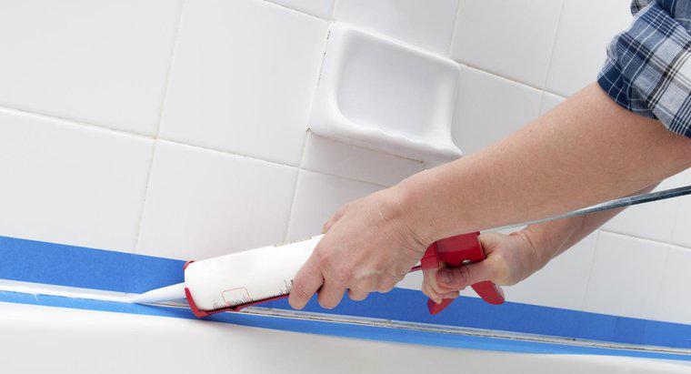 Loại Caulk nào được khuyến nghị để lắp đặt cửa kính tắm?